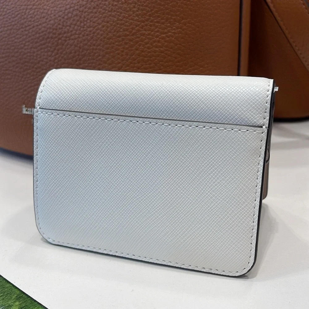 Kate Spade Madison Small Bifold Wallet
Meringue 
NWT - Picture 5 of 16